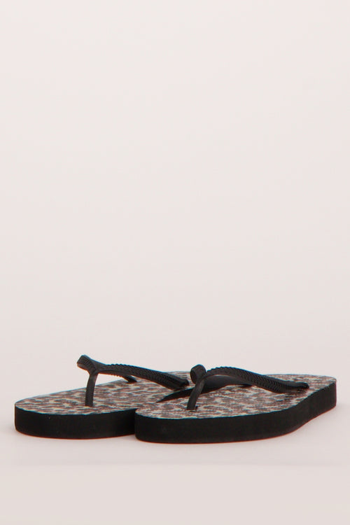 Zwarte sandaaltjes van ONLY® met reptielprint zool en effen zwarte bandjes.