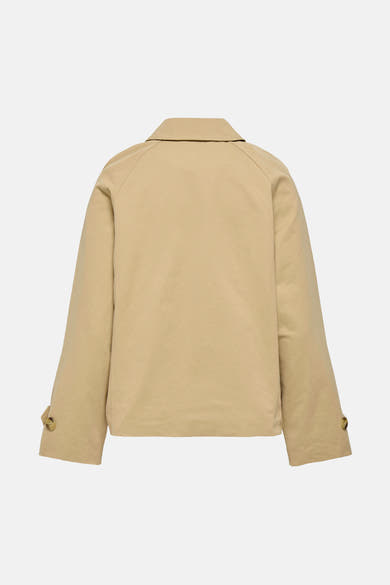 Veste courte beige van JDY, avec manches longues et boutons sur les poignets.