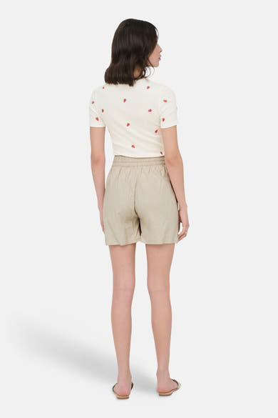 Korte beige short van JDY, met een elastische tailleband en geweven textuur.