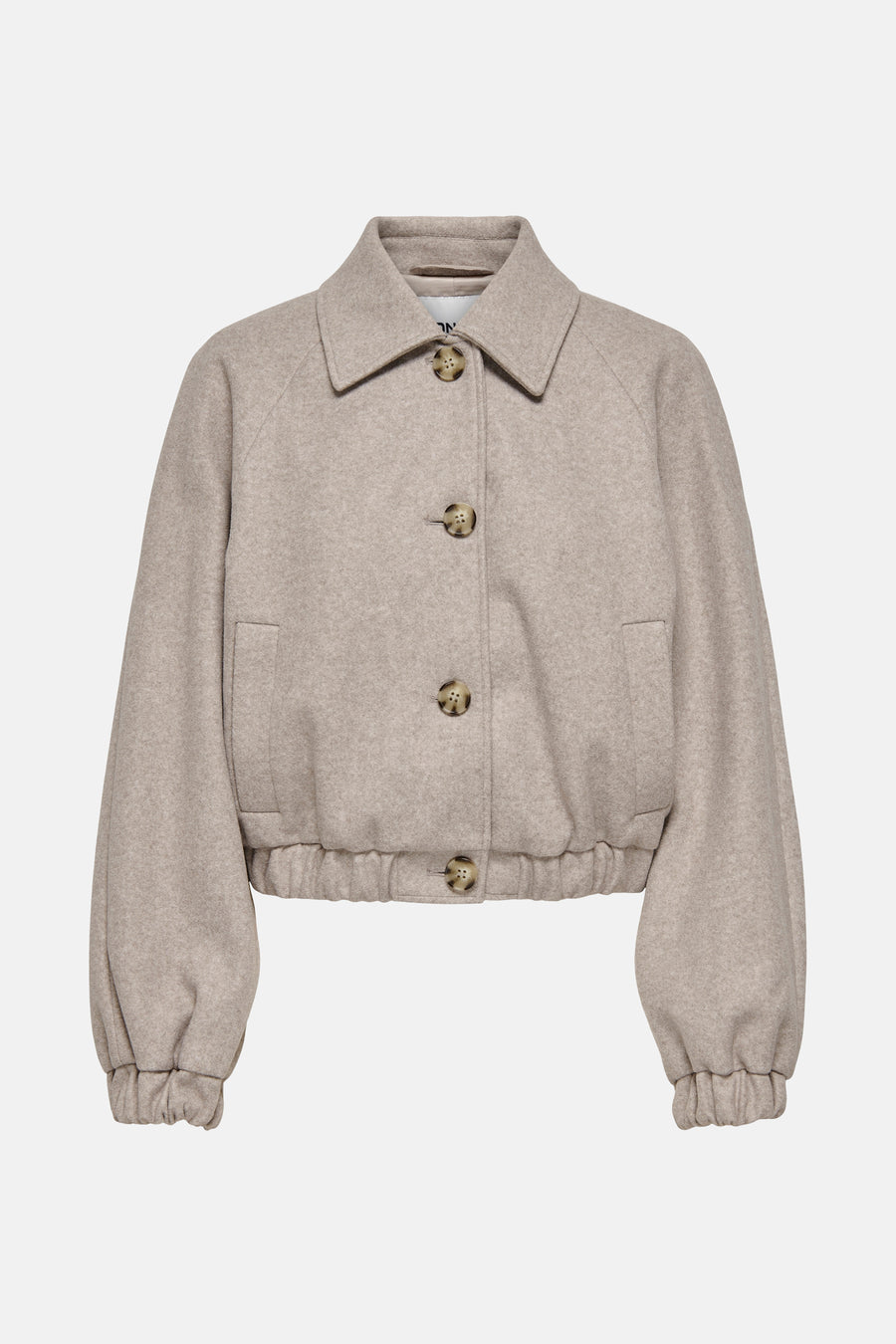 Veste courte beige de ONLY, avec fermeture boutonnée et manches ballon resserrées.