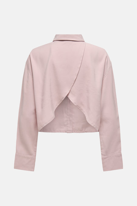 Blouse rose à manches longues de ONLY, avec une coupe croisée au dos.
