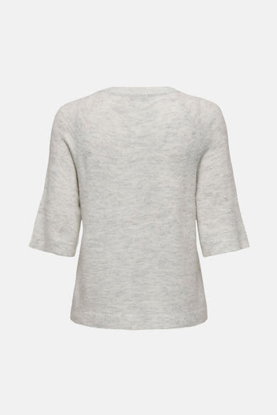 Pull à col rond blanc de JDY, manches trois-quarts évasées et texture douce.