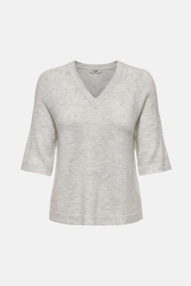 Pull à col rond blanc de JDY, avec manches trois-quarts évasées et texture douce.
