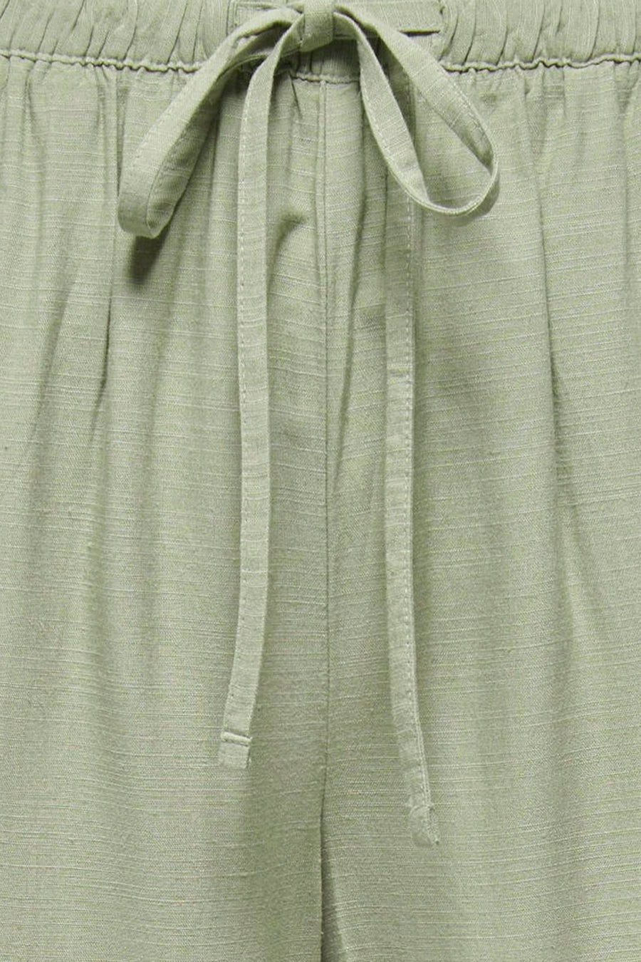 Pantalon vert de JDY, avec cordon de serrage et texture en lin.