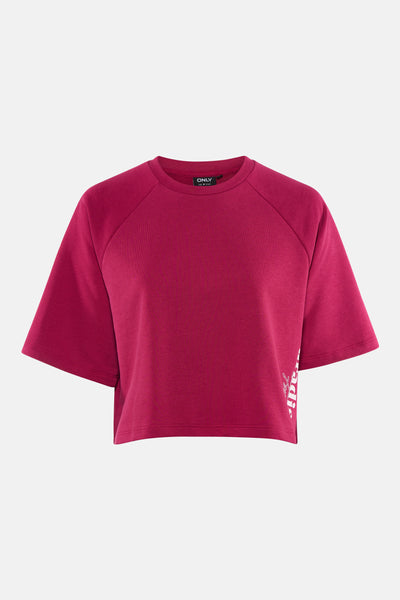 Roze effen T-shirt met korte mouwen van ONLY®, met ronde hals, raglanmouwen en witte grafische tekst aan de zijkant.