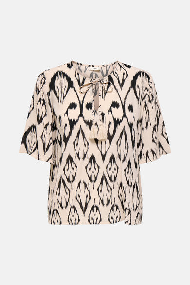 Beige blouse met korte mouwen van JDY, met een zwart ikat-patroon en een getextureerde stof.