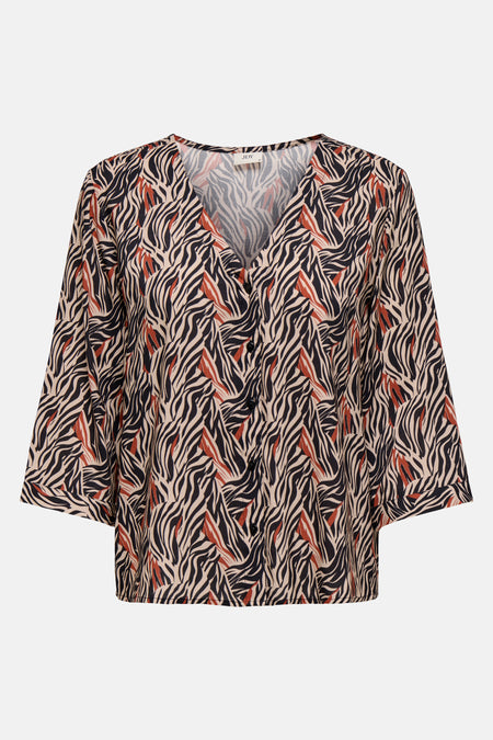 JDY veelkleurige blouse met lange mouwen, met een zwart en roestkleurig zebrapatroon op een beige achtergrond.