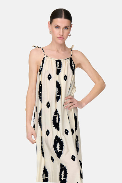 Robe longue beige de ONLY®, à motifs noirs abstraits, avec des bretelles tressées.