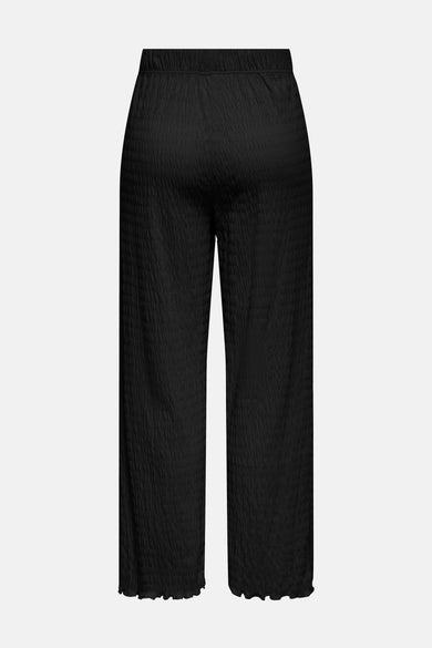 Pantalon noir texturé de ONLY, avec taille élastique et coupe ample.