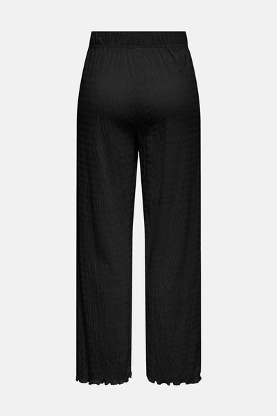 Pantalon noir texturé de ONLY, avec taille élastique et coupe ample.