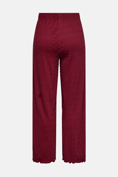 Bordeaux ONLY broek, met wafeltextuur en elastische tailleband.