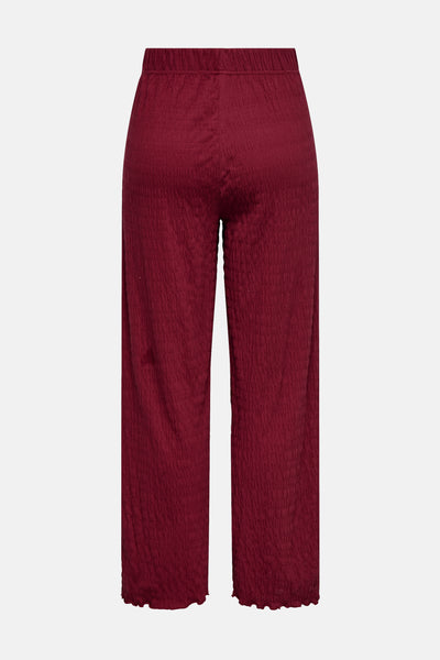 Pantalon bordeaux ONLY, à texture gaufrée et taille élastique.
