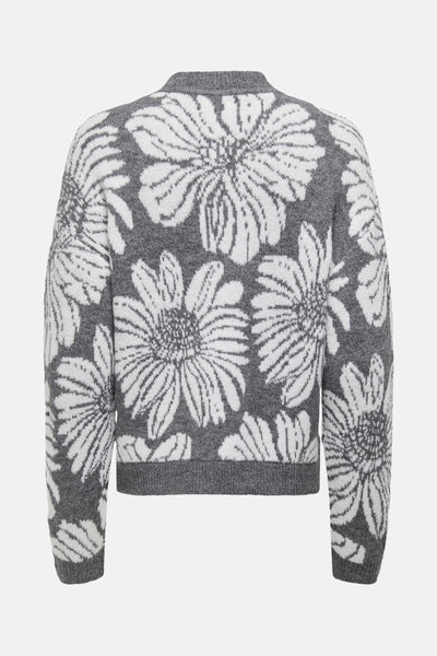 Pull à col rond gris de JDY, à motif floral blanc sur l'ensemble et manches longues.
