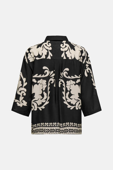Chemise à manches longues noire de JDY, avec motif floral contrastant et coupe ample.