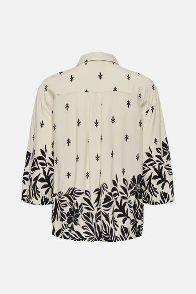 Ecru lange mouwen blouse van JDY met zwart bloemenpatroon aan de onderkant.