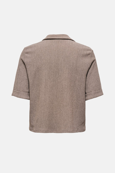 Chemise à manches courtes beige de JDY, avec un motif texturé subtil et des manches à revers.