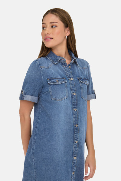 Medium blue denim robe with button front, chest pockets, and rolled sleeves, side view on model