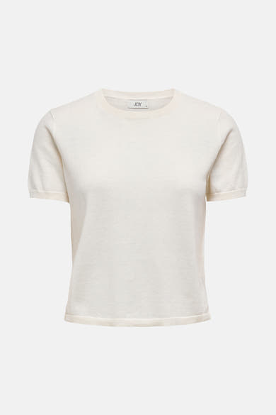 Pull beige en maille de JDY, avec des manches courtes bouffantes.