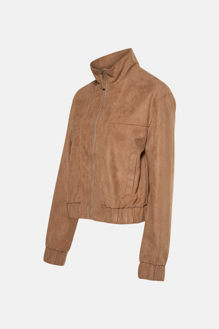 Korte beige jas van JDY met zilveren ritssluiting, zijzakken en elastische lange mouwen.