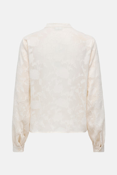 Ecru blouse met lange mouwen van JDY, met een toon-op-toon bloemenpatroon.
