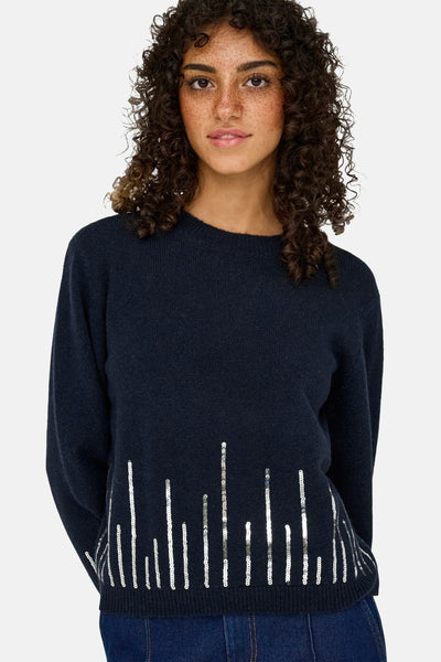 Pull bleu à col rond de JDY orné de sequins argentés verticaux sur le bas.