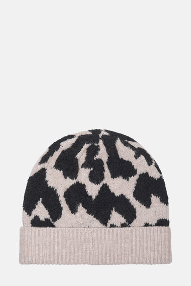 Bonnet multicolore de JDY, avec un motif tacheté noir et beige sur une texture tricotée.
