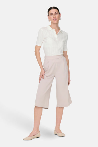Wit poloshirt met korte mouwen van JDY met een mesh-textuur en een klassieke kraag.