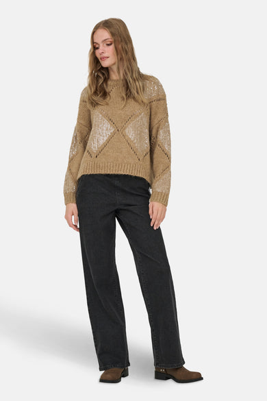 Pull à col rond beige par ONLY, avec des détails ajourés et des paillettes scintillantes.