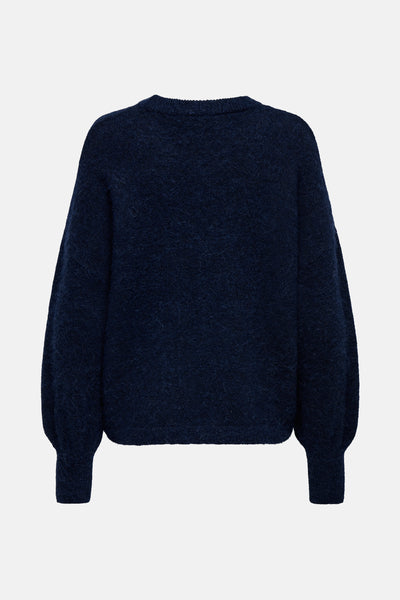 Pull à col rond bleu foncé de ONLY®, avec une texture duveteuse et des manches bouffantes.