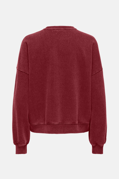 Sweat bordeaux de ONLY, avec un col rond et une texture délavée.