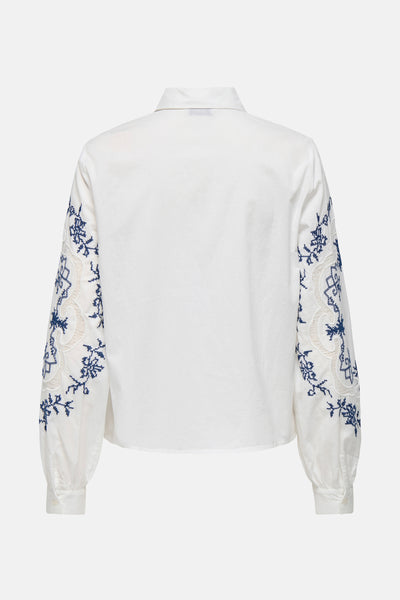 Wit overhemd met lange mouwen van JDY met blauwe bloemenborduursels.