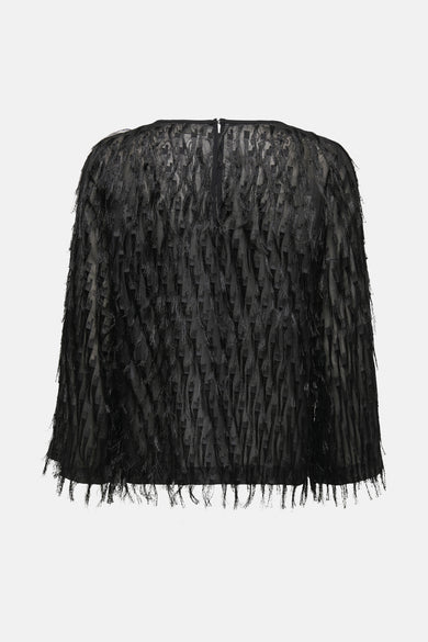 Blouse noire à manches longues de JDY, avec des franges décoratives et une texture transparente.