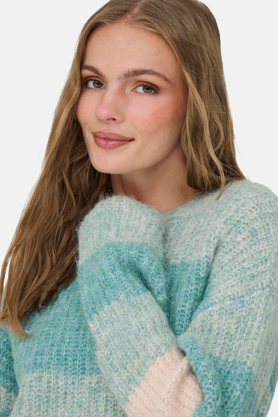 Ronde hals trui van JDY in het blauw, met een zachte en pluizige textuur.