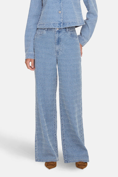 Jean coloré en denim bleu clair de JDY, avec motif ondulé texturé.