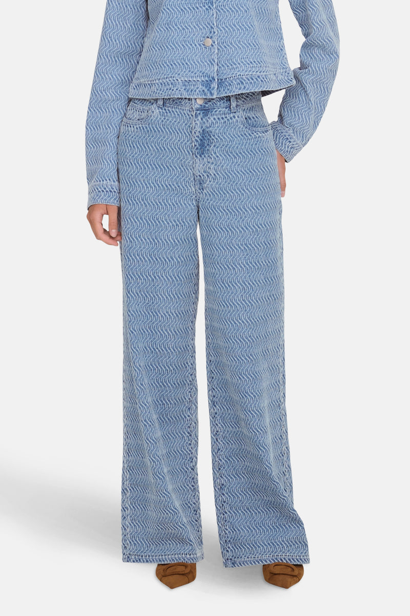 Jean coloré en denim bleu clair de JDY, avec motif ondulé texturé.