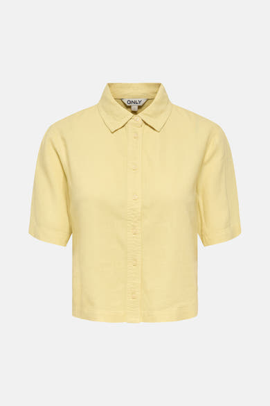 Chemisier jaune clair à manches courtes de ONLY, avec une texture subtile et une coupe classique.
