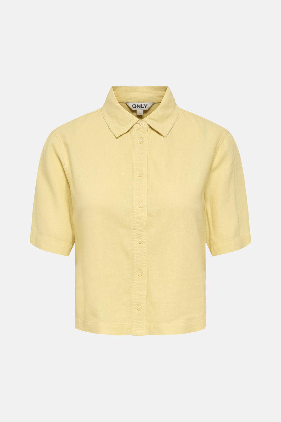 Chemisier jaune clair à manches courtes de ONLY, avec une texture subtile et une coupe classique.
