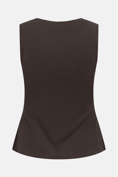 Gilet marron de ONLY, coupe péplum élégante, avec une texture subtile visible de dos.