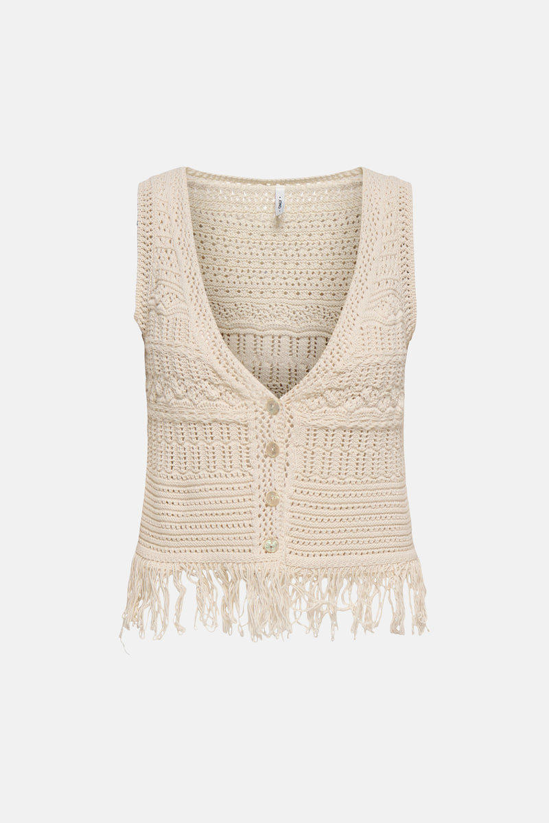 Beige gebreid vest van ONLY, met decoratieve franjes aan de onderkant, opengebreid patroon en gehaakte textuur.
