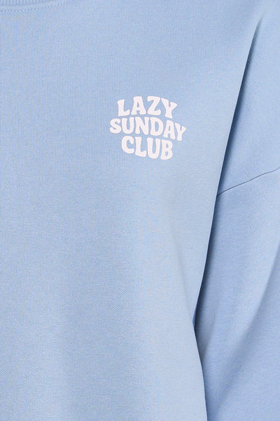 Blauwe trui met ronde hals van ONLY® met grafische print 'Lazy Sunday Club'.