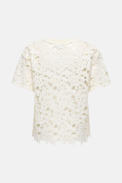 T-shirt blanc uni à manches courtes de JDY, en dentelle florale délicate, avec une doublure ton sur ton.