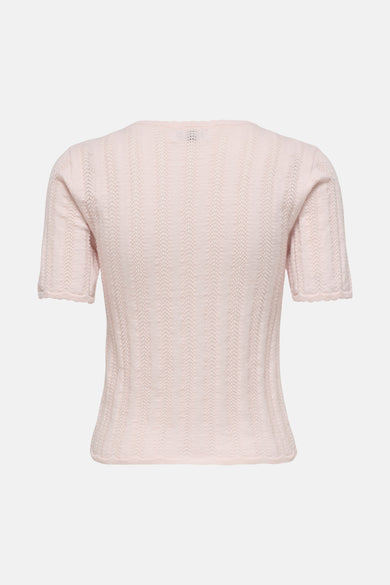 Pull rose pâle à manches courtes de JDY, vu de dos, avec motif ajouré vertical et bords festonnés.