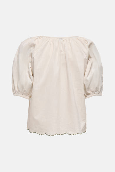 T-shirt écru à manches courtes de JDY, avec un ourlet festonné et des manches bouffantes.
