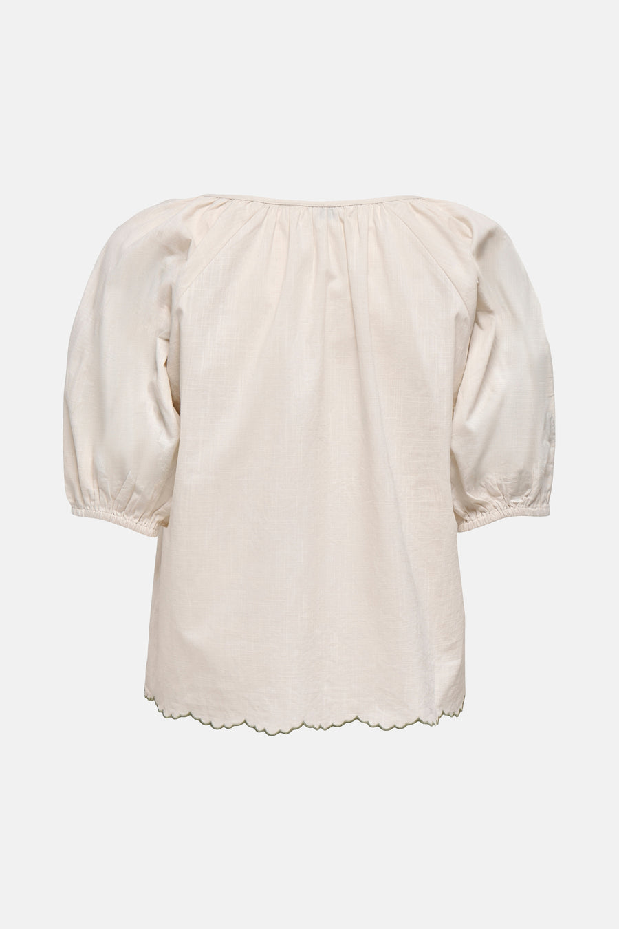 T-shirt écru à manches courtes de JDY, avec un ourlet festonné et des manches bouffantes.
