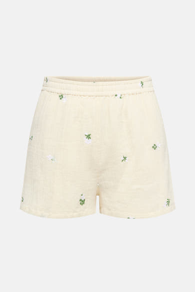 Korte beige JDY met witte en groene bloemrijke broderies, elastische taille.