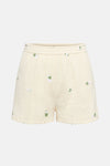 Korte beige JDY met witte en groene bloemrijke broderies, elastische taille.