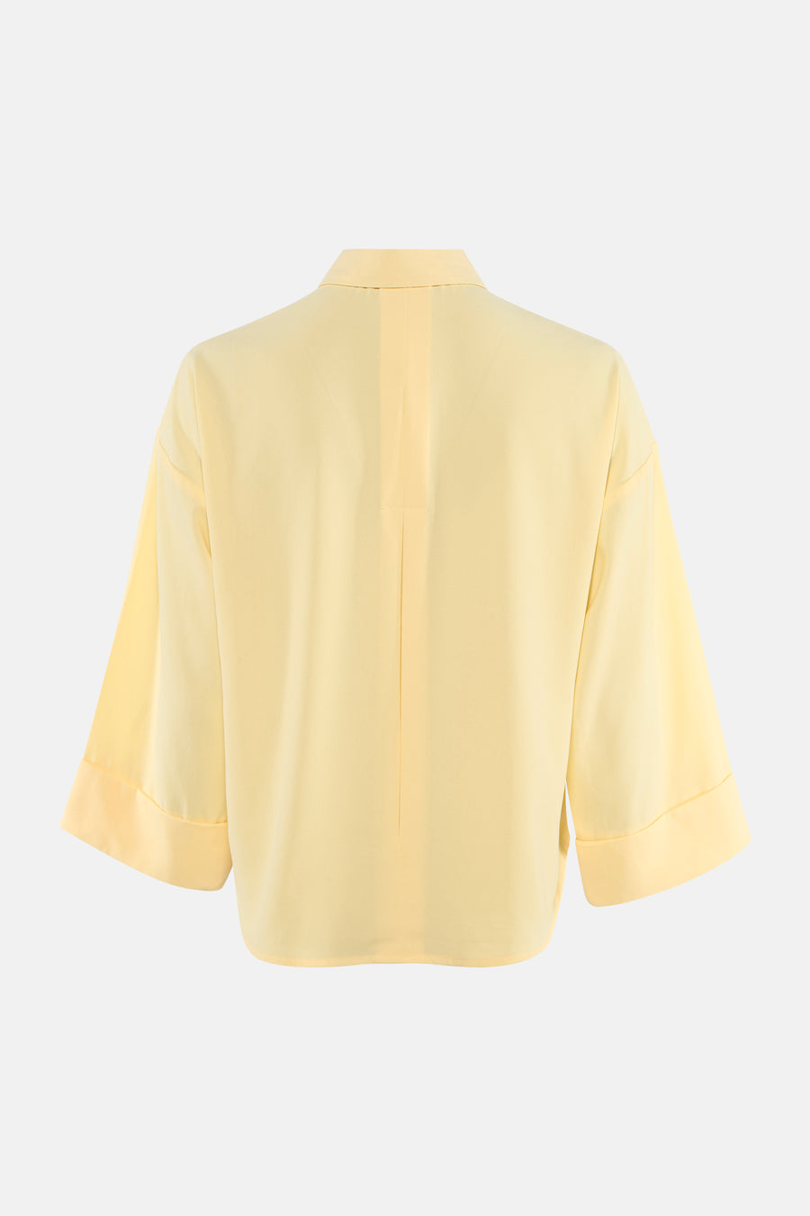 Chemise jaune à manches longues par ONLY®, vue de dos, avec pli creux vertical.
