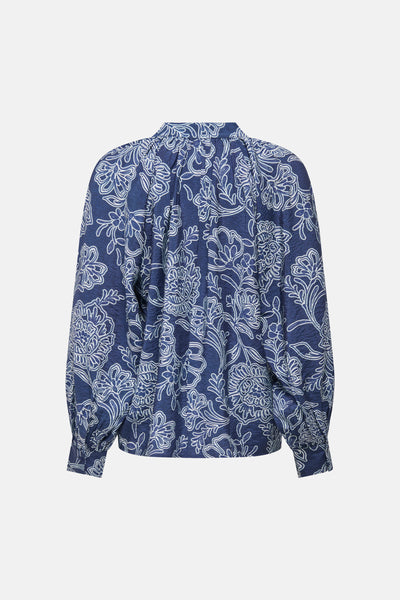 Blouse à manches longues bleue de JDY, à motif floral blanc sur toute la surface.
