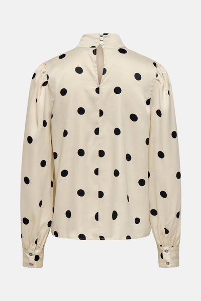 Blouse à manches longues écru de ONLY, à pois noirs et détails boutonnés au dos.