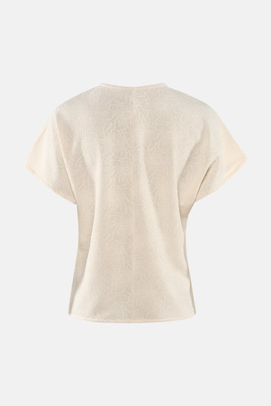 T-shirt beige à manches courtes de ONLY, à motif floral en relief sur toute la surface.